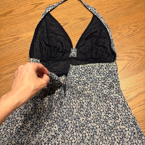 Floral women's top like new, halter neck with back zipper, semi-transparent hem