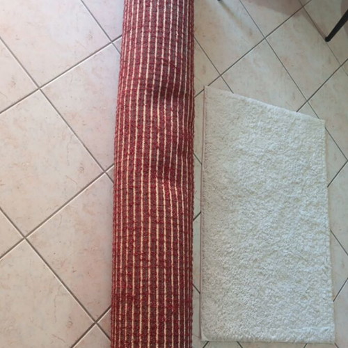 Handmade rug like new in burgundy and beige shades