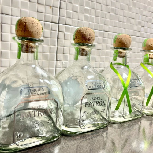 Patron champagne bucket like new with 4 empty silver bottles