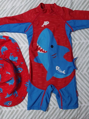 Baby swimsuit and hat like new