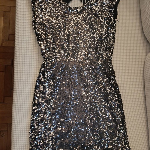 Mini dress new with sequins and impressive back, size small, black