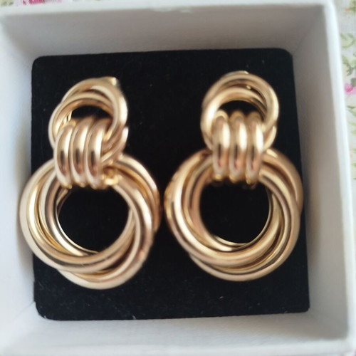 H&M gold-tone earrings like new with two connected circles design