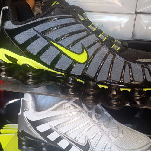 Nike Shox athletic shoes new, black and gold