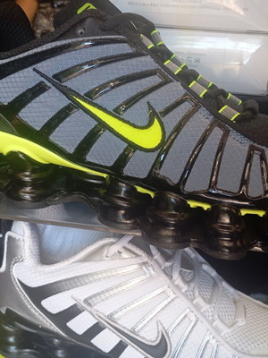 Nike Shox athletic shoes new, black and gold