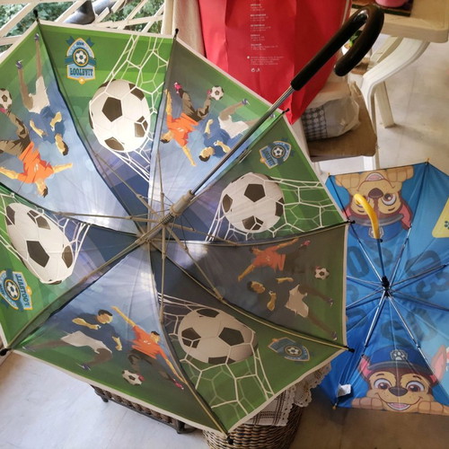 Children's umbrellas used, yellow and black