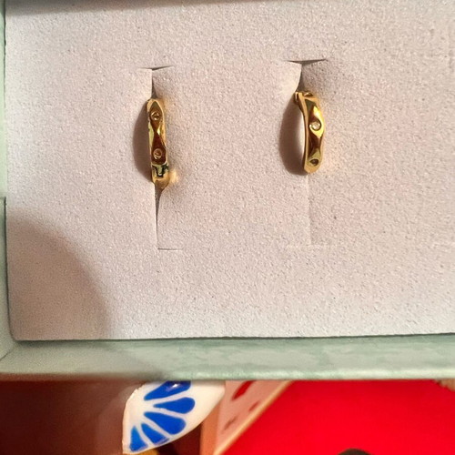Women's stainless steel hoop earrings like new, gold-colored
