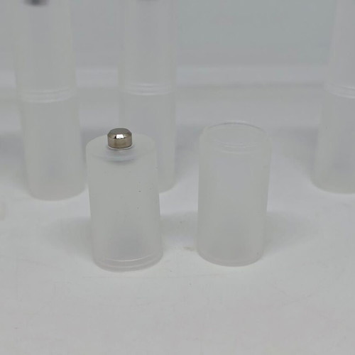 Battery adapters AA to C set of 8, like new, plastic transparent