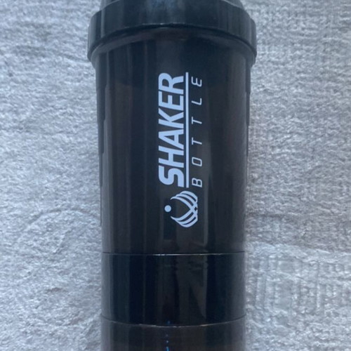 Black Protein Shaker Bottle new with storage compartment