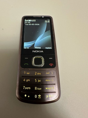 Nokia 6700 used, brown, with battery