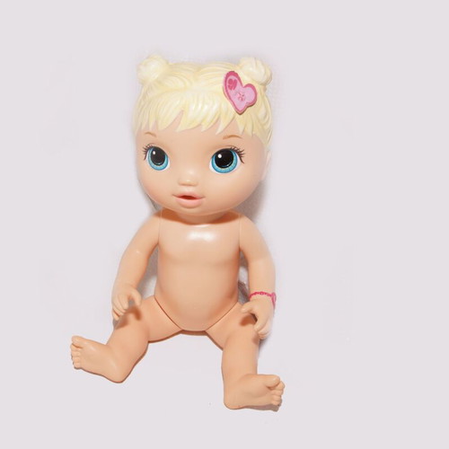 Girl doll used, hard plastic, size about 20 cm