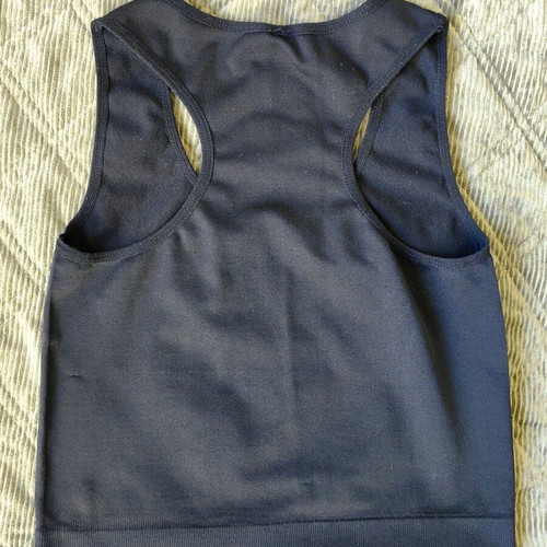 Sports top like new, black and orange, elastic fabric