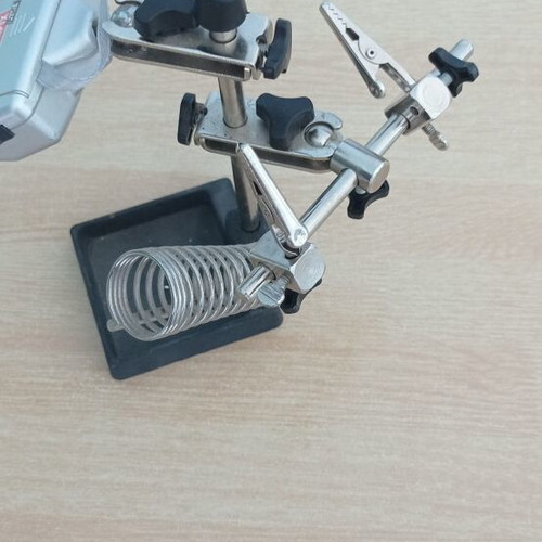 Magnifying glass with modeling accessories like new