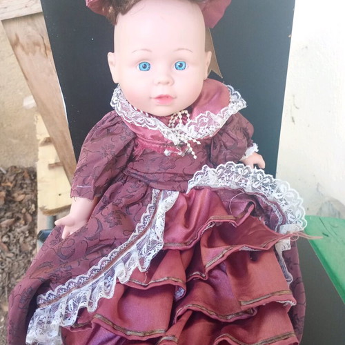 Doll with Victorian dress used, soft body, plastic head