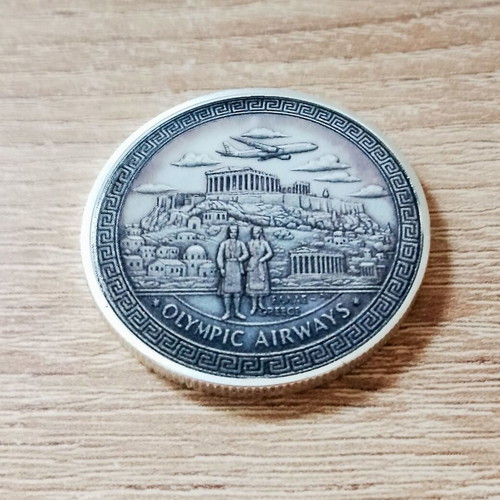 Olympic Airways commemorative coin like new with silver finish