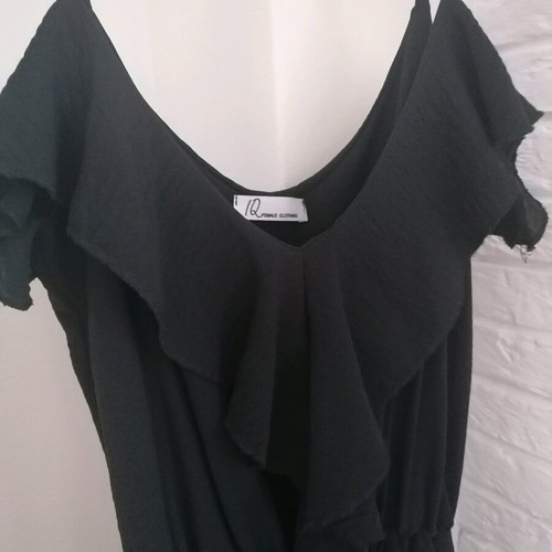 One-piece jumpsuit with ruffles like new, black, size M