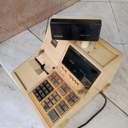 Vintage cash register used for decor without drawer