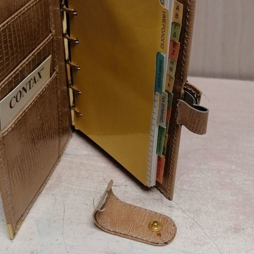 Leather organizer with sun damage