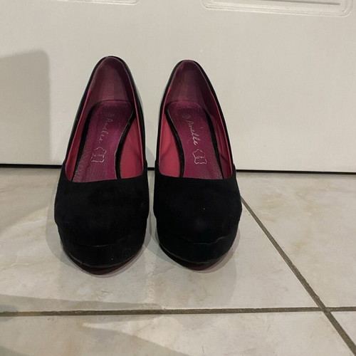 Black pumps used, half glossy - half suede style, size 39
