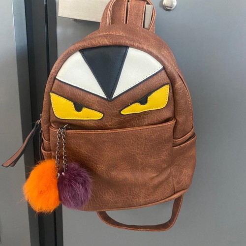 Monster Eyes backpack new leather 24x21 with pom-poms