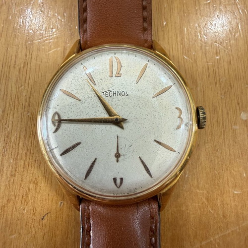 Technos wind-up watch like new, unisex, gold color