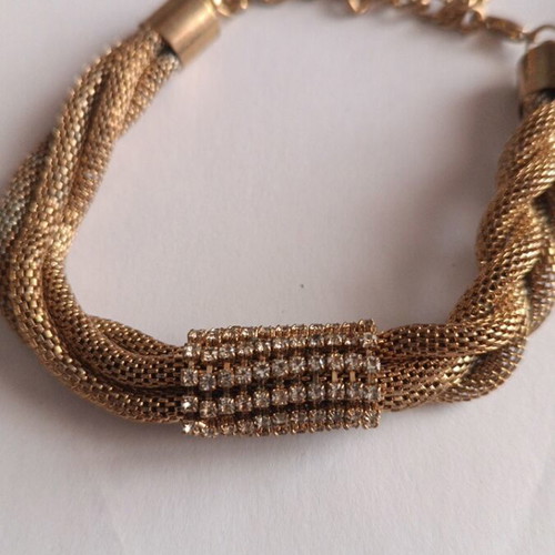 Jewelry set new with 3 pairs of pink earrings and gold bracelet