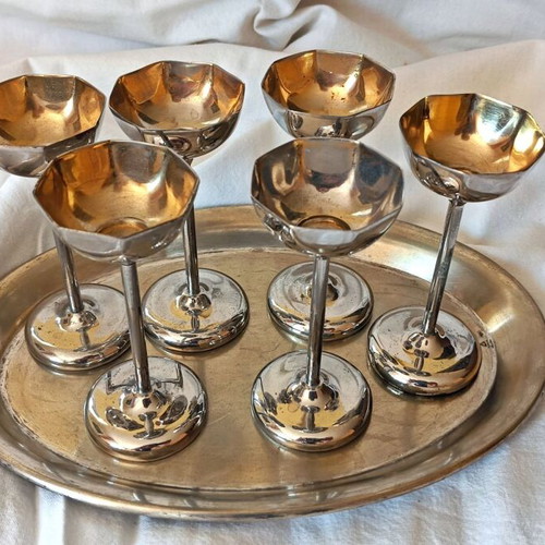 Vintage liqueur glasses used, brass with silver plating and gold interior