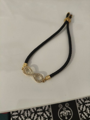 Women's adjustable bracelet with black cord and infinity symbol with zircon