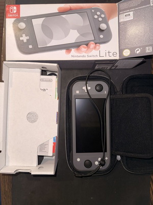 Nintendo Switch Lite console with accessories, 64GB card