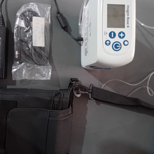Portable Oxygen Concentrator like new with charger and carrying case