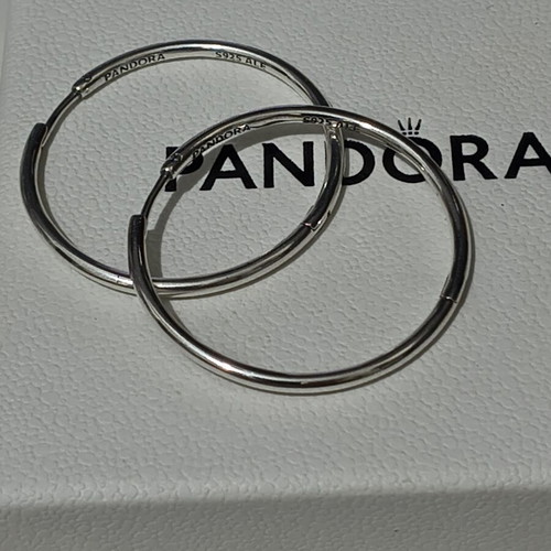 Pandora silver hoop earrings like new with engraved logo