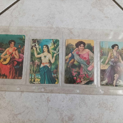 Collectible phone cards used, set of 4 with folk painting 1999-2000