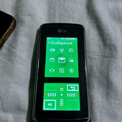 LG KF600 phone like new with missing volume buttons