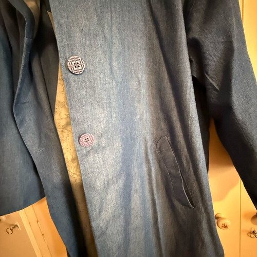 Namaste trench coat used in denim color with lining and hood