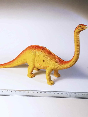 Plastic dinosaur figure used, toy animal
