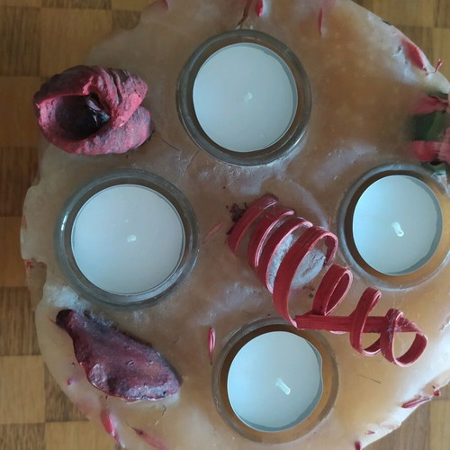 Decorative candle with dried flowers used