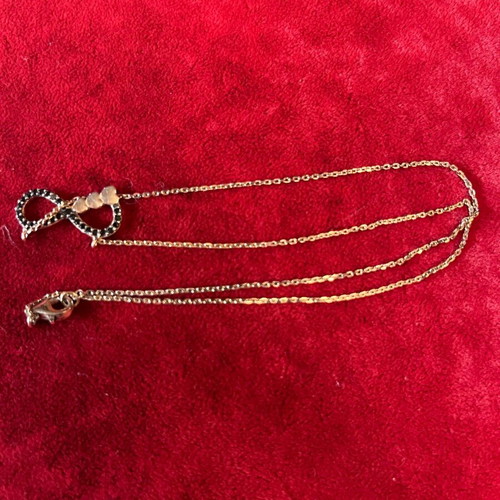 Silver 925 necklace with gold vermeil coating, infinity design with gold hearts, used