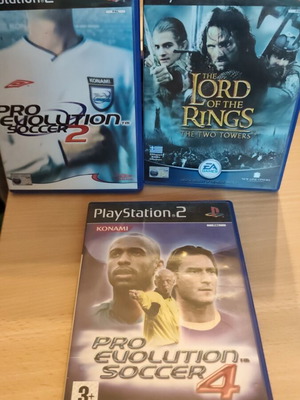 PlayStation 2 game cases with manuals used, all together