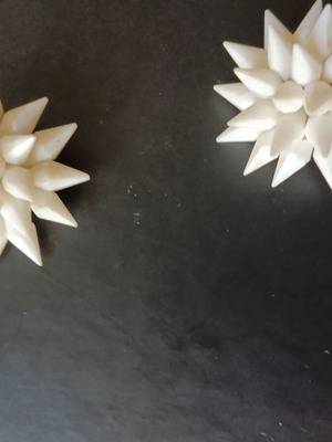 Vintage white clip-on earrings used from the 1960s