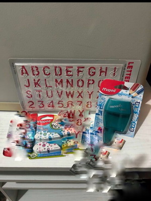 Maped school supplies set with alphabet stencil, erasers, sharpener