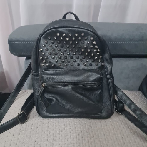 Black women's backpack in eco leather with metal studs