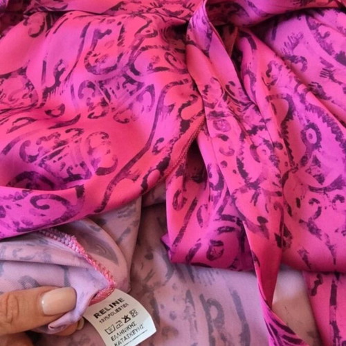 Wrap dress in bright fuchsia with ruffle sleeves