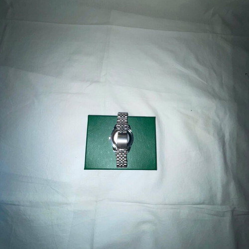 Seiko watch with blue dial and silver bracelet