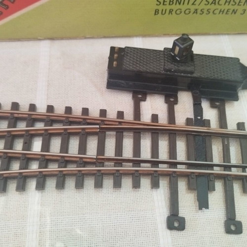 HO scale railway switch parts with bridge pieces and direction change base