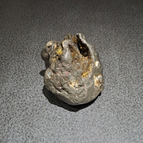 Industrial slag collectible 964g with golden inclusions, used