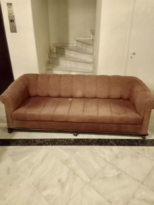 Four-seater sofa with wheels used