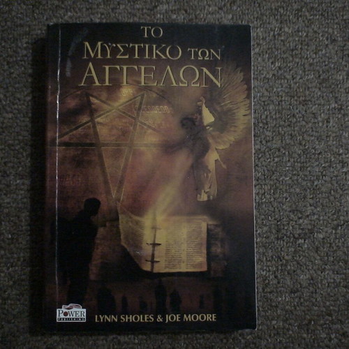 Set of 4 occult books used in good condition
