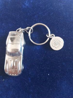 Collectible metal Ferrari keychain new, silver with Shell logos