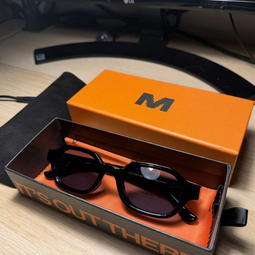 Meller Cumbi unisex sunglasses black with blue polarized lenses
