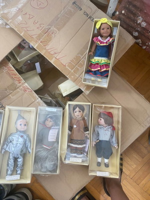 Porcelain dolls new, set of 27 with various designs