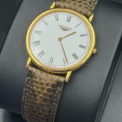 Longines Le Grande Clasique watch used, gold color, battery powered